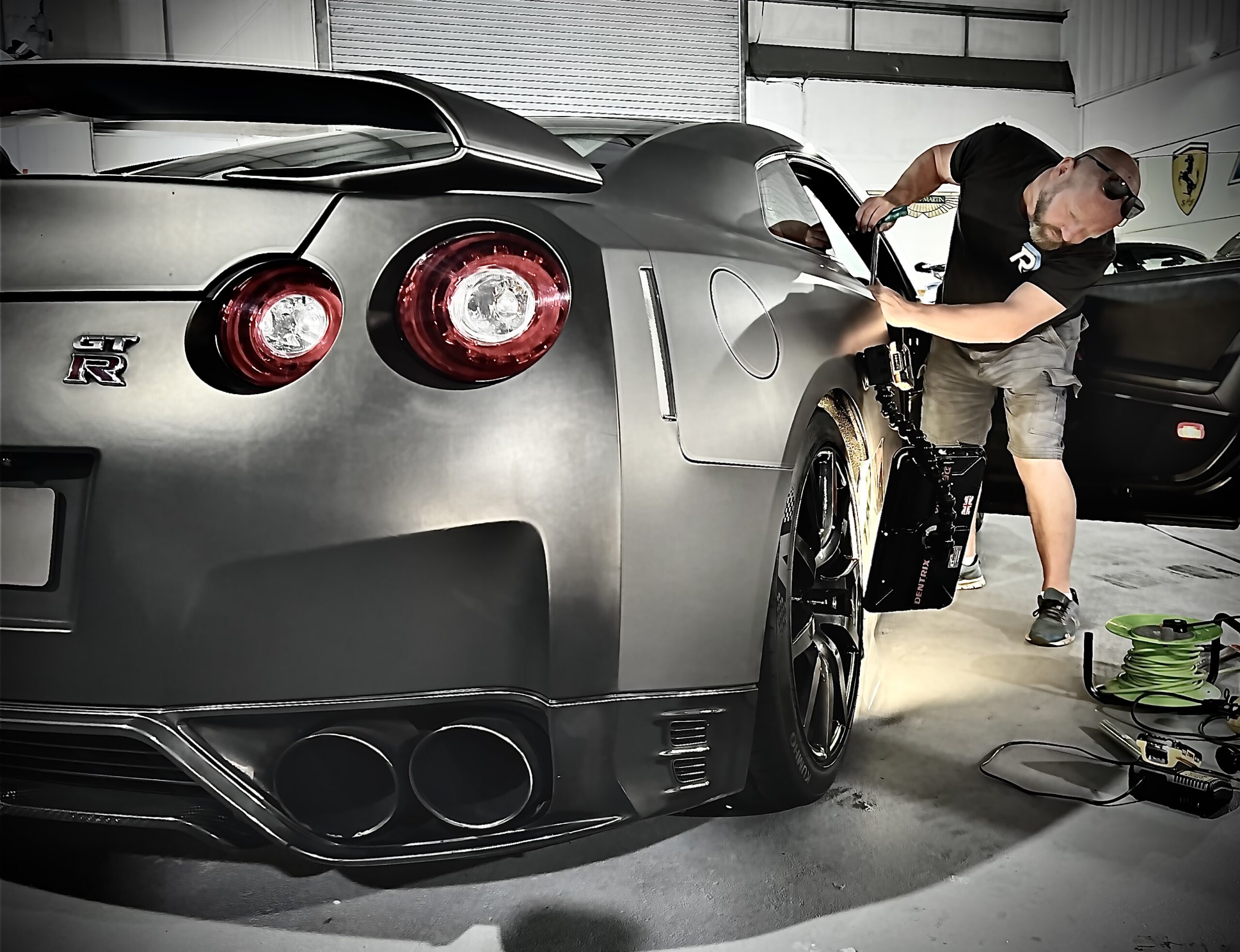 Paintless dent repair being carried out on a Nissan GT-R at Dent Repair UK